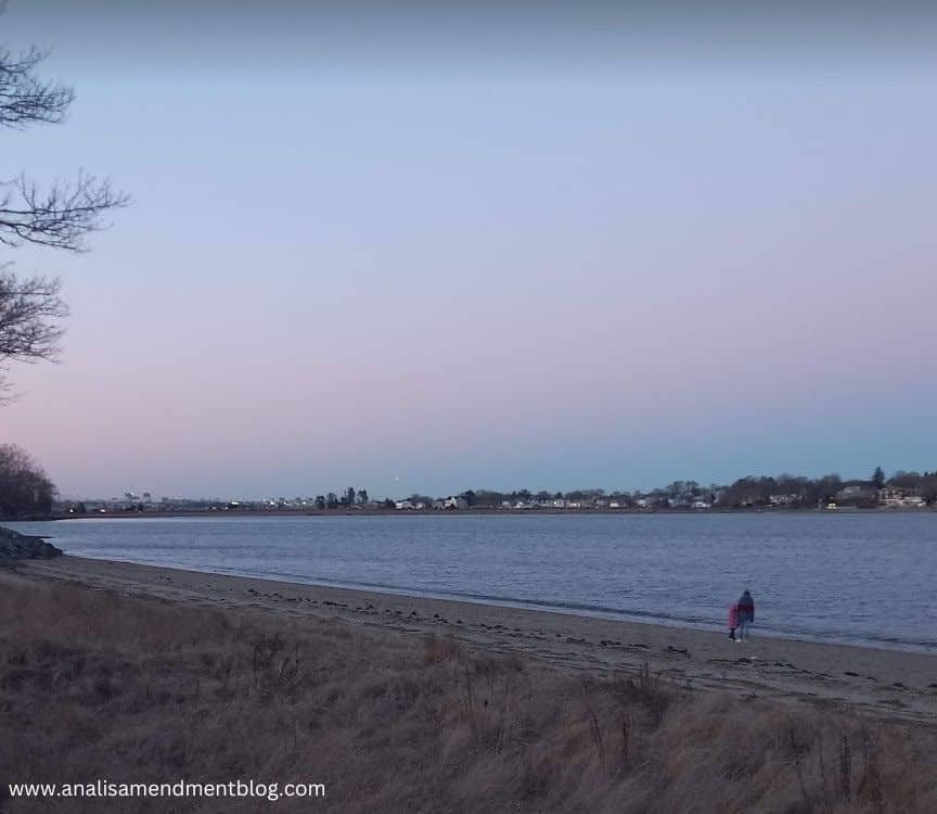 people walking on Wollaston Beach