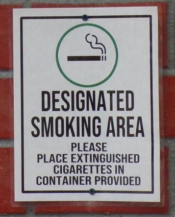 designated smoking area sign