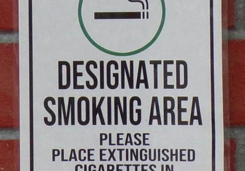 designated smoking area sign