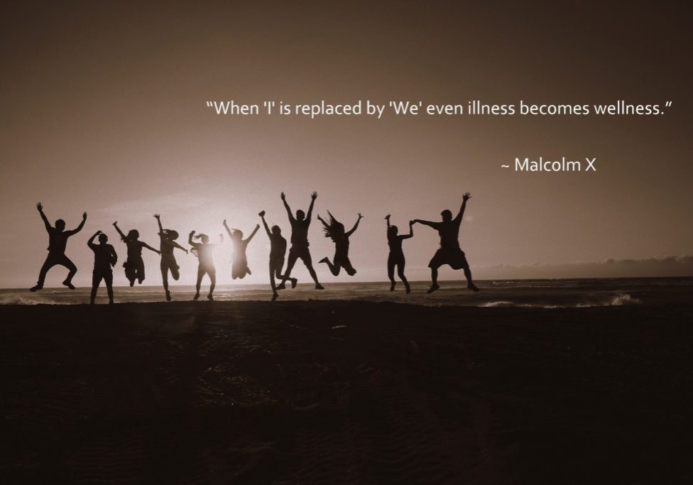 Image of people holding hands jumping with text of quote.